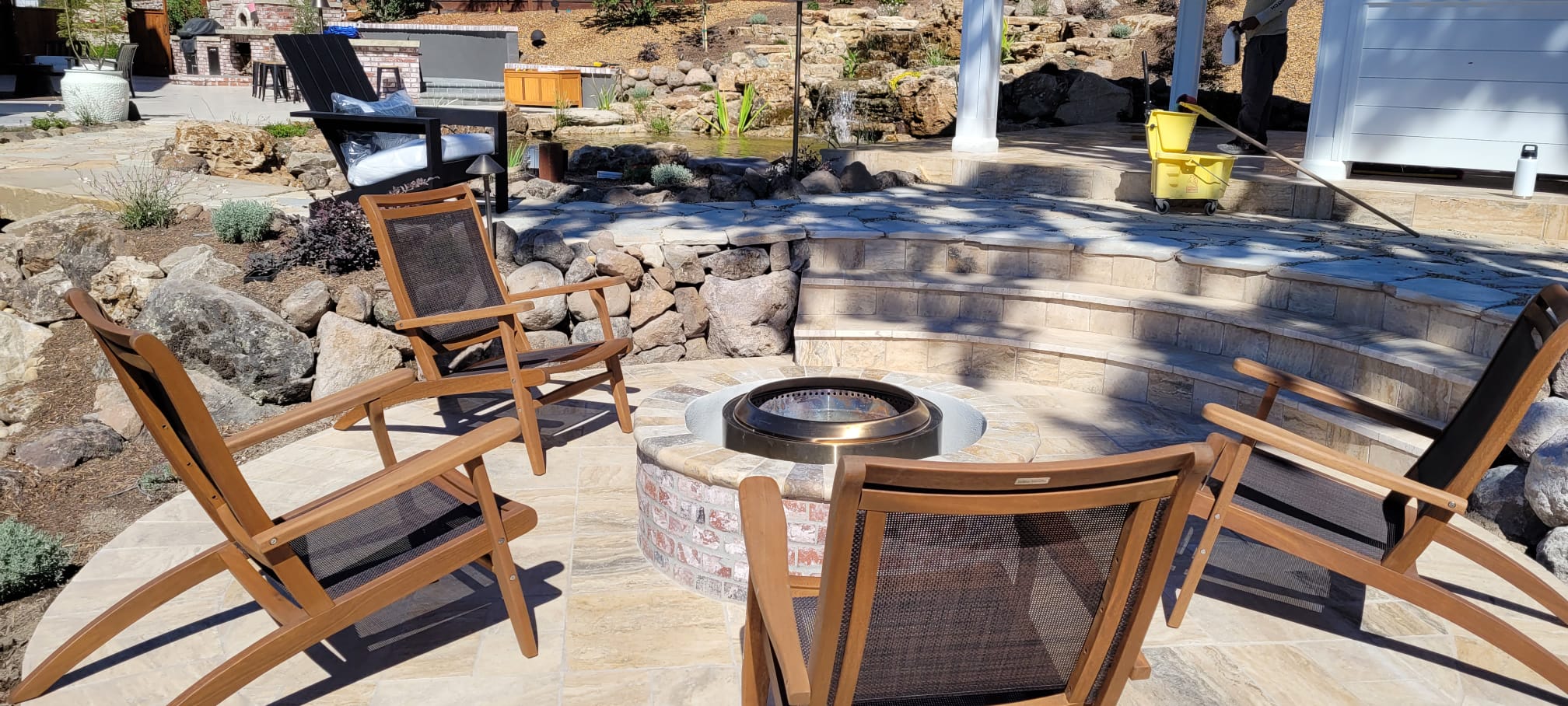 Custom firepit with seating in Alamo